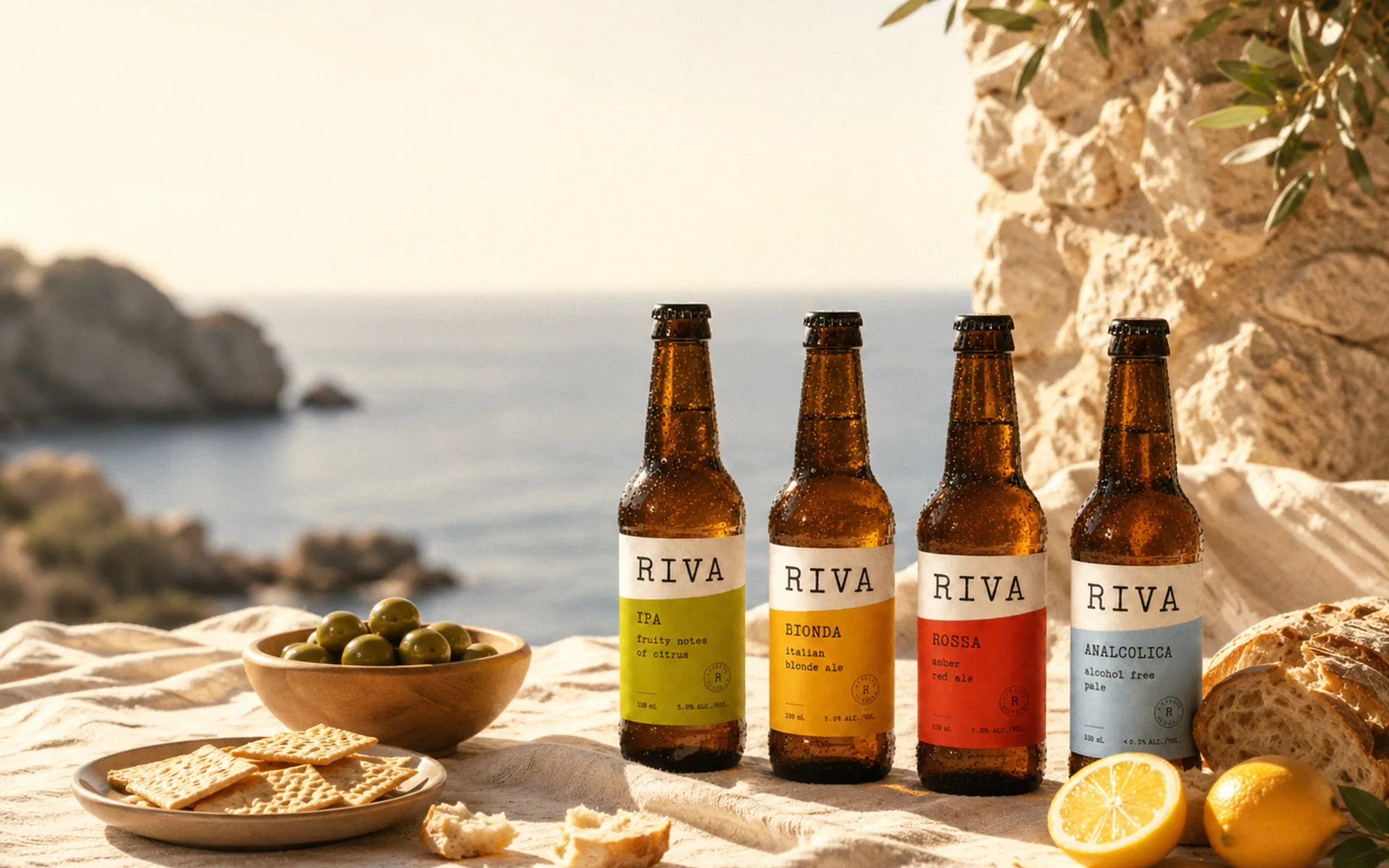 Four Riva beers arranged beside the Mediterranean sea